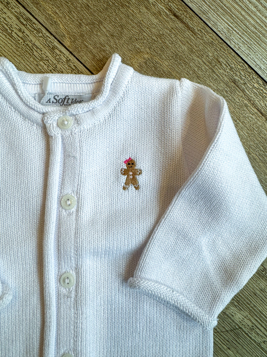 A Soft Idea Gingerbread Girl Baby Cardigan in White