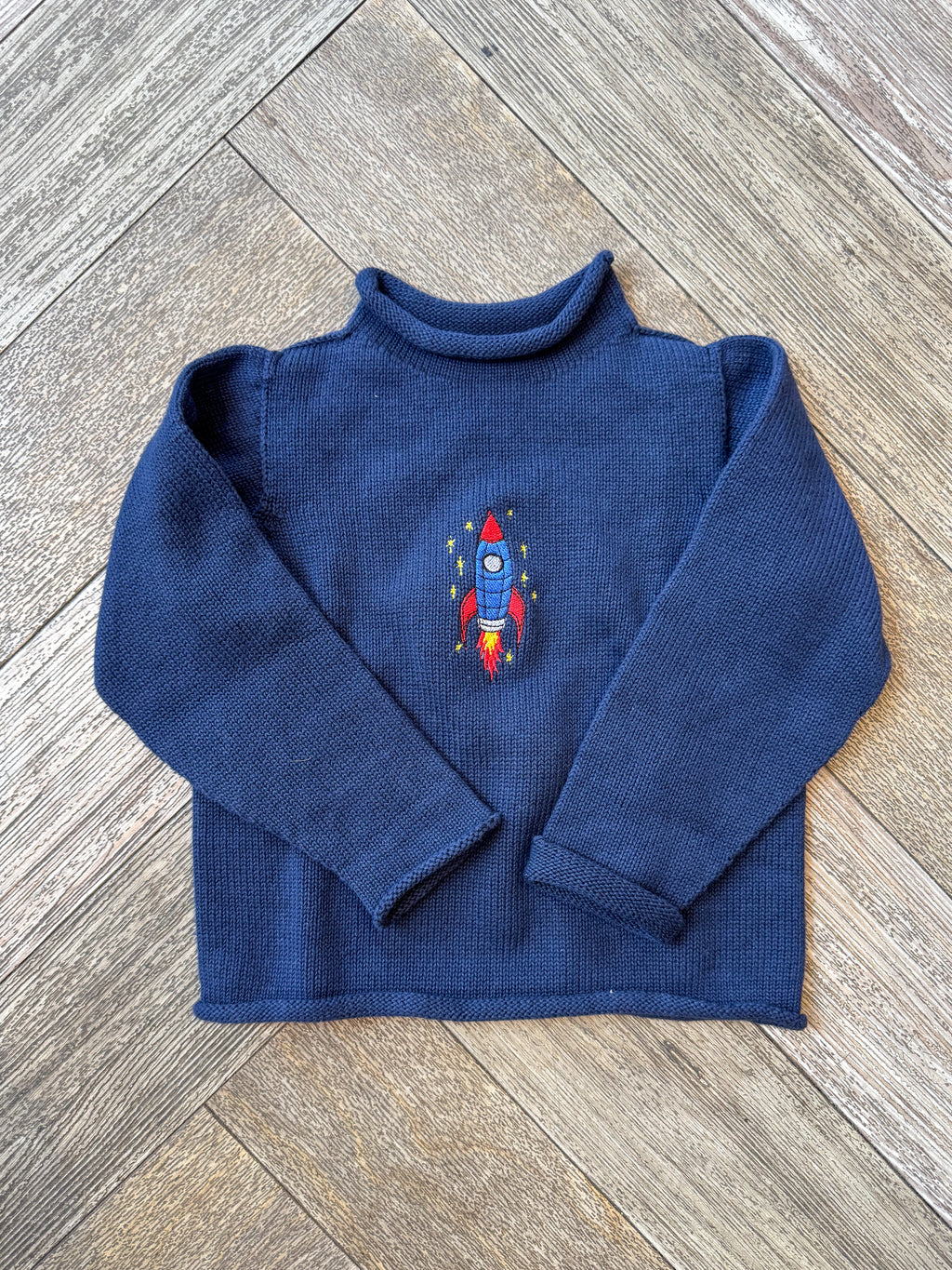 A Soft Idea Rocket Ship Roll Neck Sweater in Navy