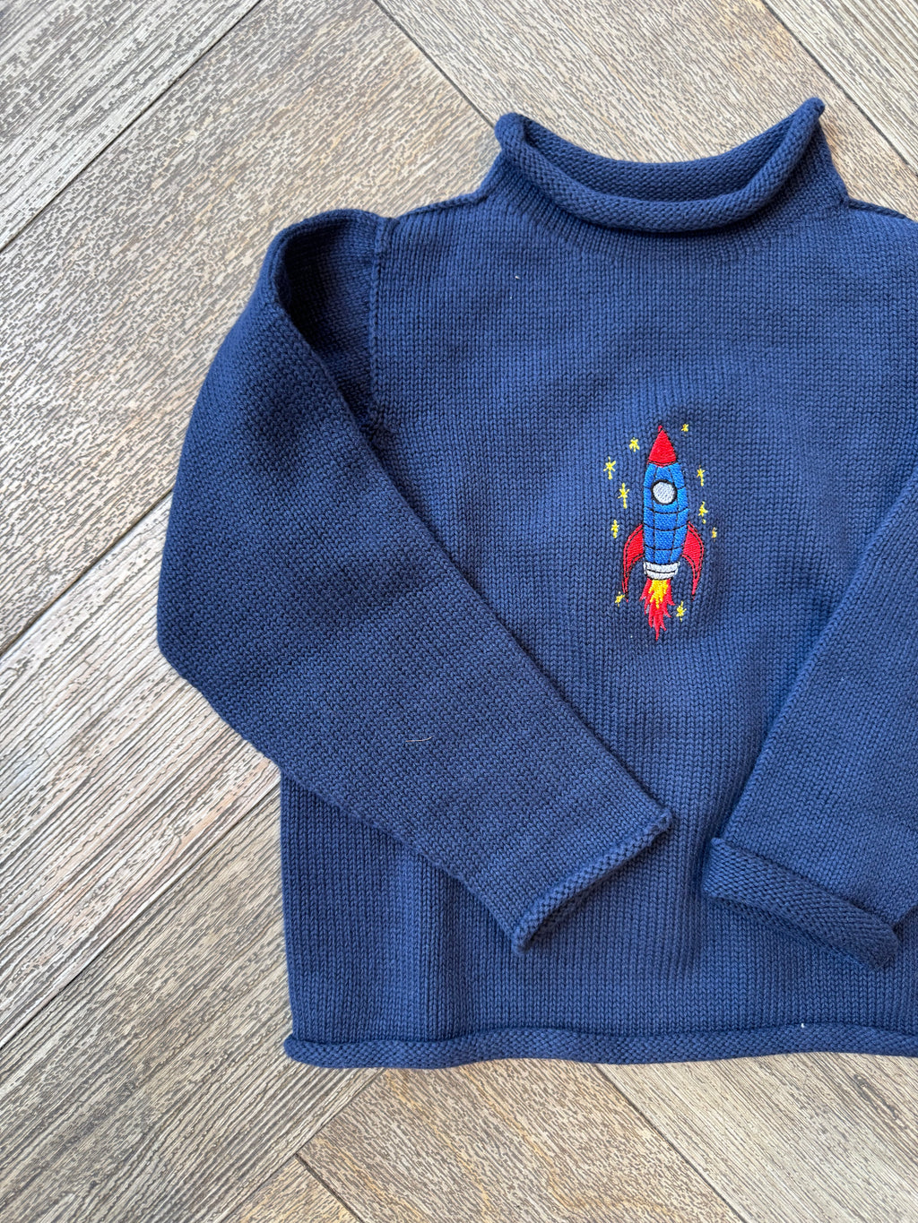 A Soft Idea Rocket Ship Roll Neck Sweater in Navy