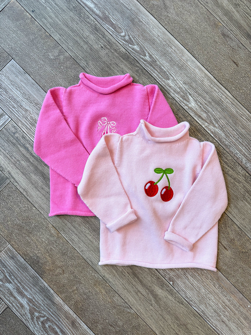 A Soft Idea Cherries Roll Neck Sweater in Light Pink
