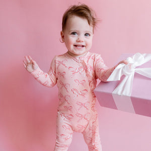 Pink Chicken Bamboo Ruffle Romper in Candy Cane Bows