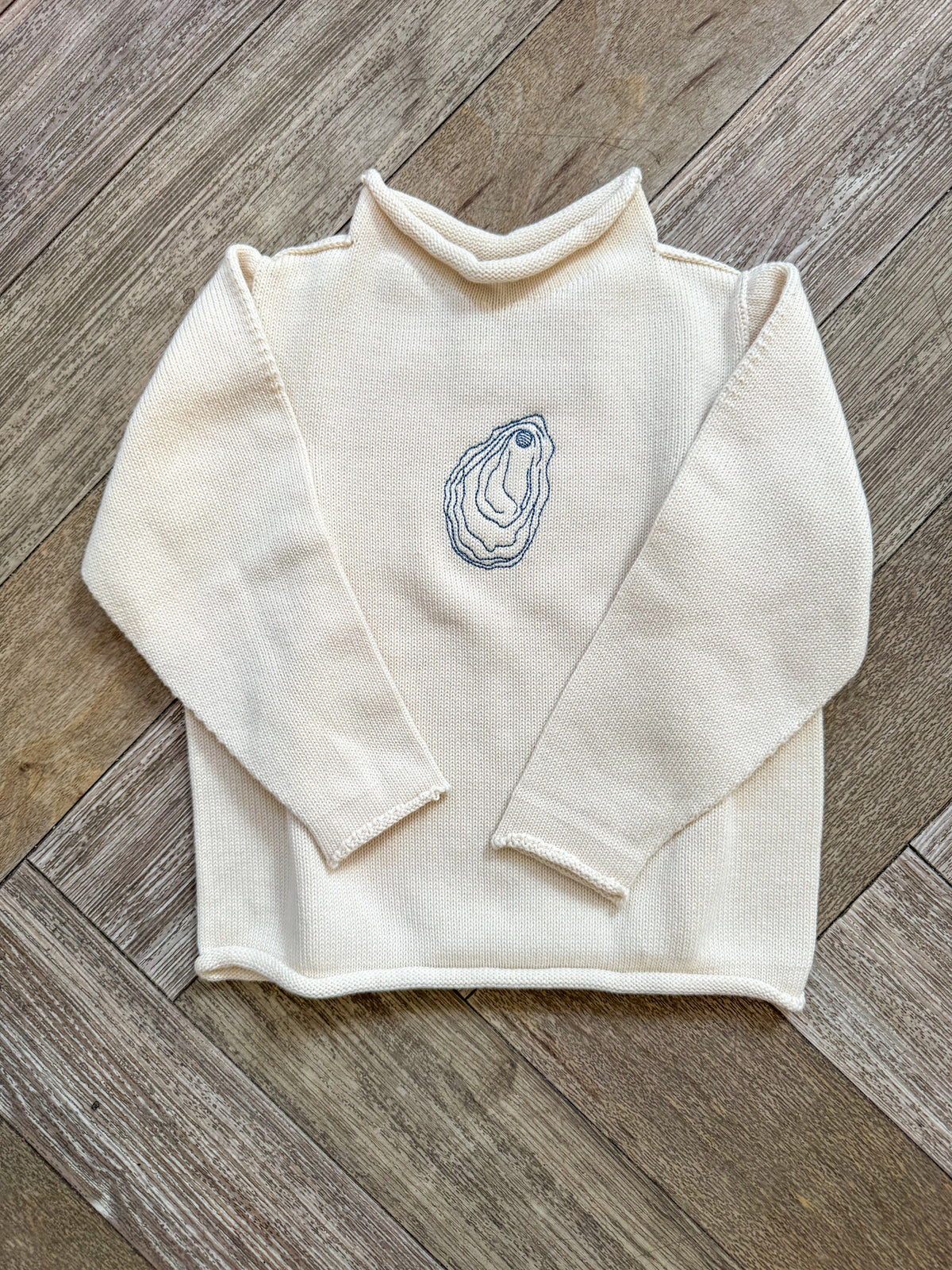 A Soft Idea Oyster Roll Neck Sweater in Natural