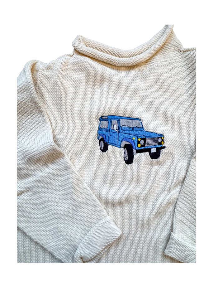 A Soft Idea Roll Neck Sweater in Natural with Land Rover